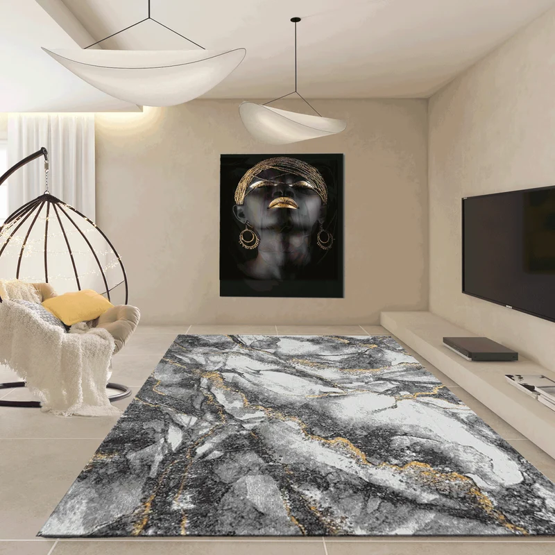 Moderner Teppich mit Marmor-Optik in Grau und Gold Tönen Wohnzimmer