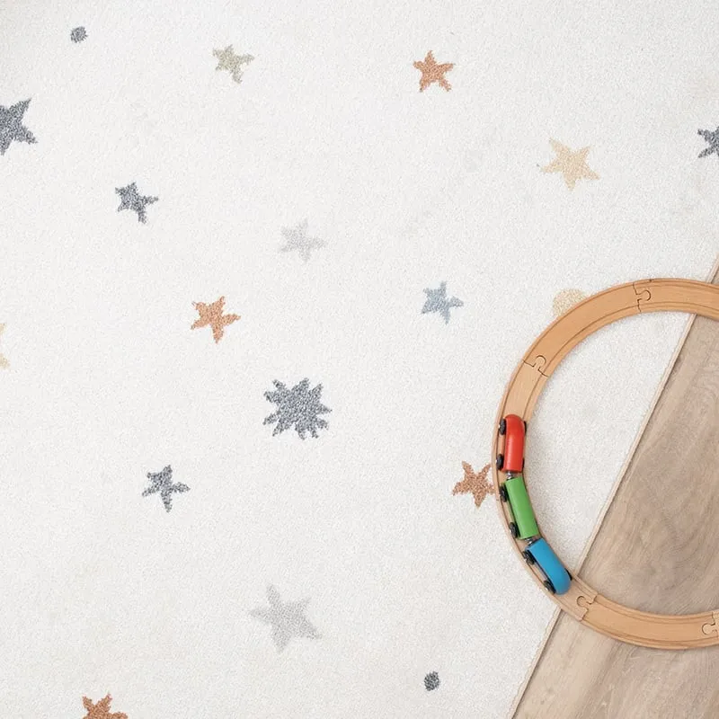 Waschbarer Kinderteppich - Ravi Stars Bunt
