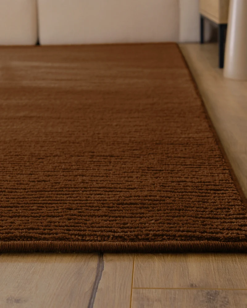 Kurzflor Teppich aus Schurwolle Braun "Castello ONE" WECONhome