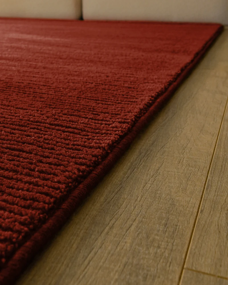 Kurzflor Teppich aus Schurwolle Purpur Rot "Castello ONE" WECONhome