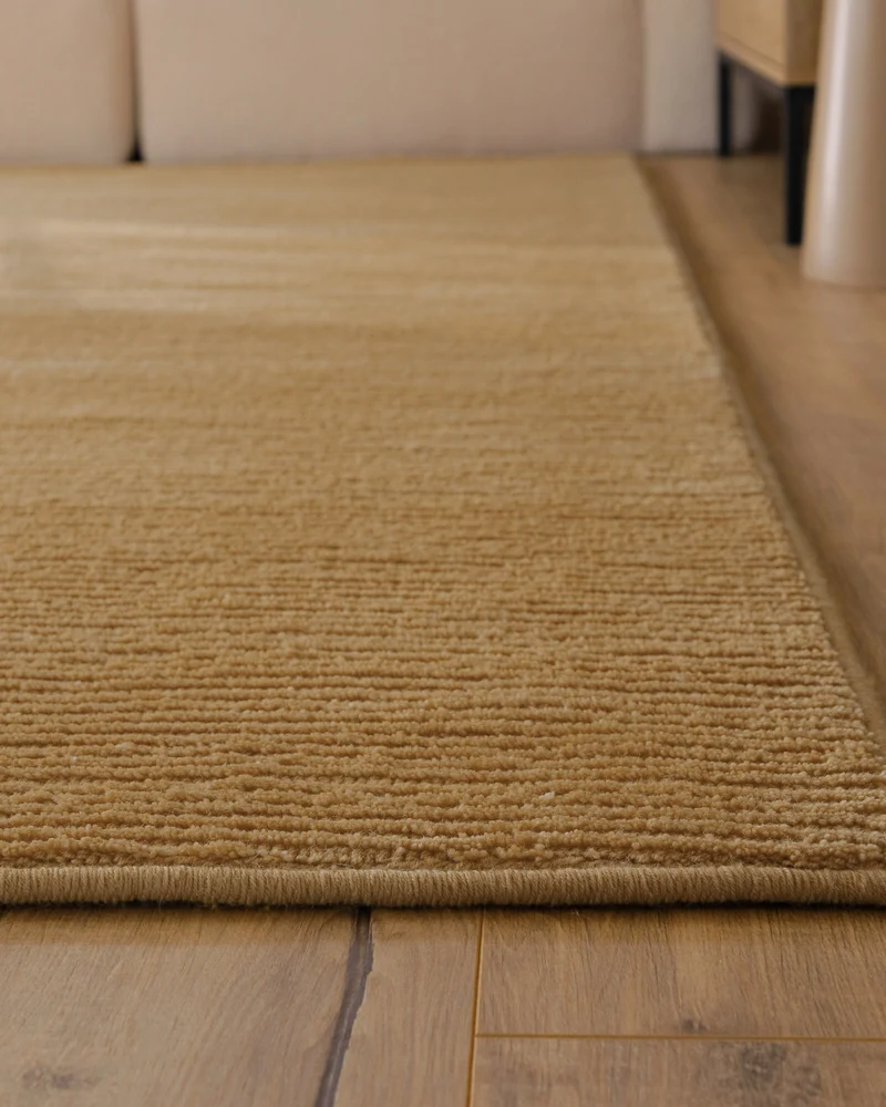 Kurzflor Teppich aus Schurwolle Karamell "Castello ONE" WECONhome