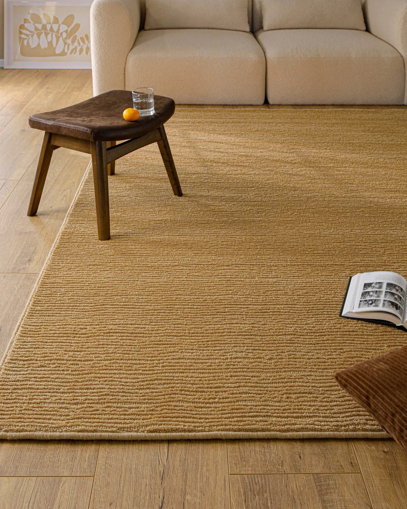 Kurzflor Teppich aus Schurwolle Karamell "Castello ONE" WECONhome