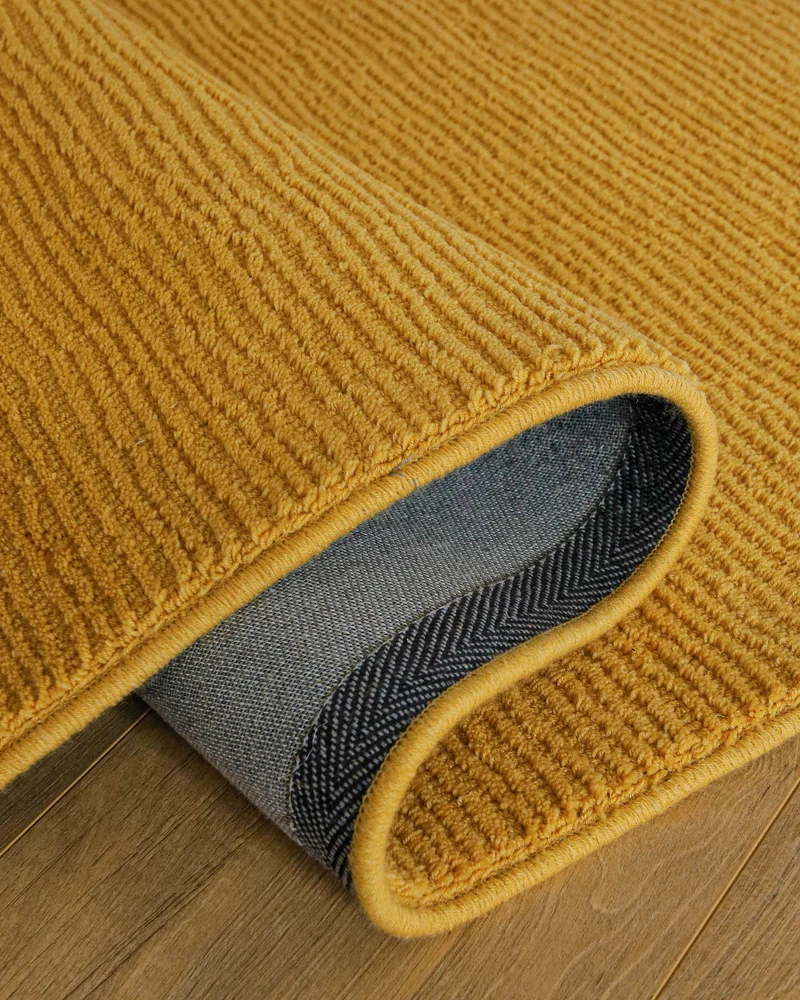 Kurzflor Teppich aus Schurwolle Gelb "Castello ONE" WECONhome