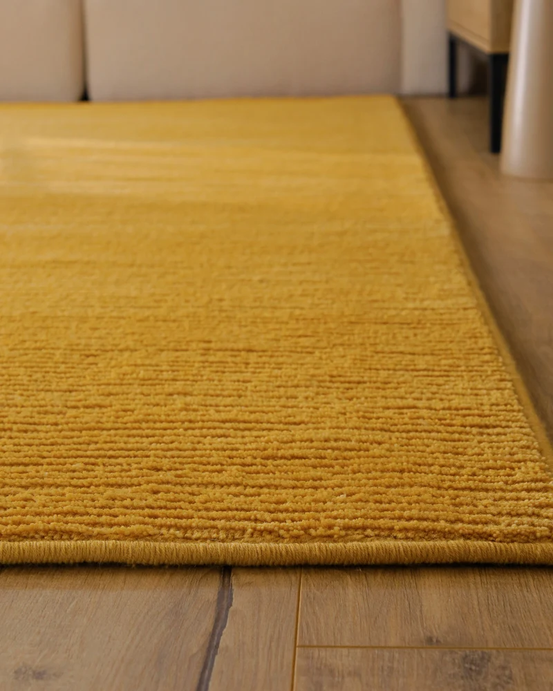 Kurzflor Teppich aus Schurwolle Gelb "Castello ONE" WECONhome