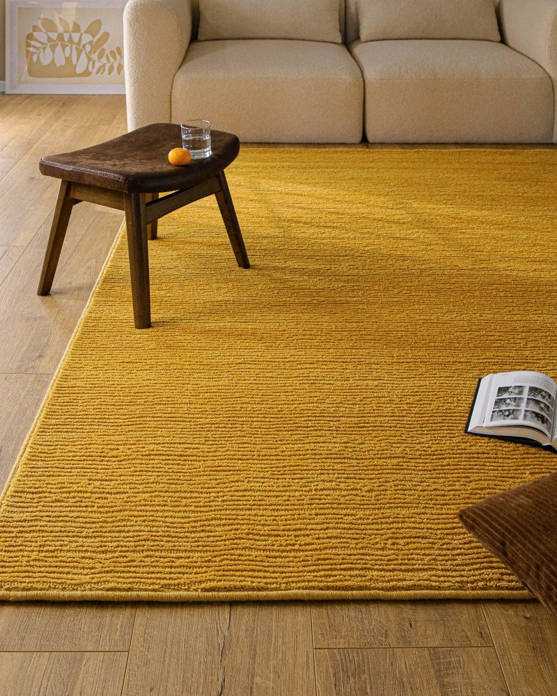 Kurzflor Teppich aus Schurwolle Gelb "Castello ONE" WECONhome
