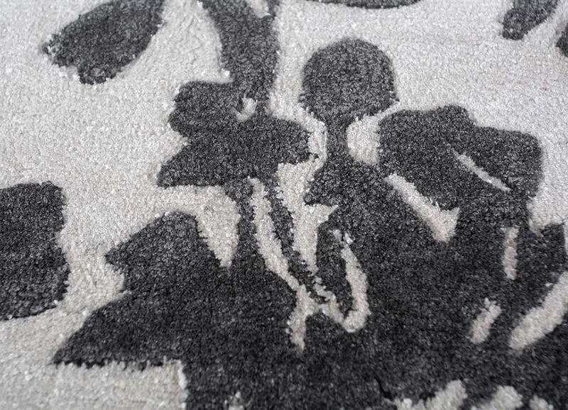Wollteppich - 180 x 270 cm - schwarz-weiß