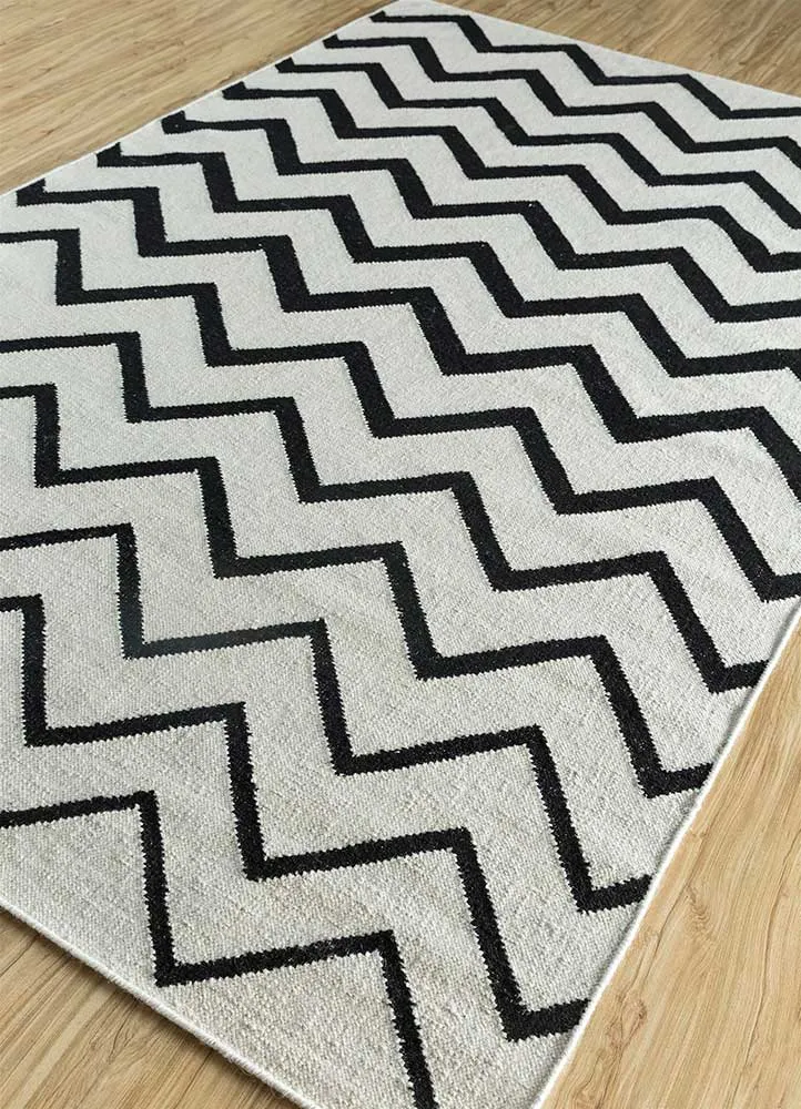 Wollteppich - 150 x 240 cm - schwarz-weiß