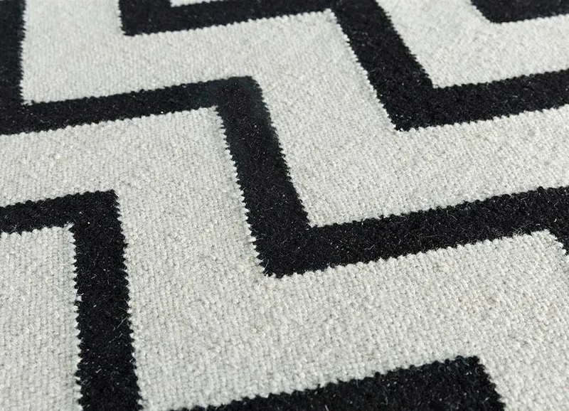 Wollteppich - 150 x 240 cm - schwarz-weiß