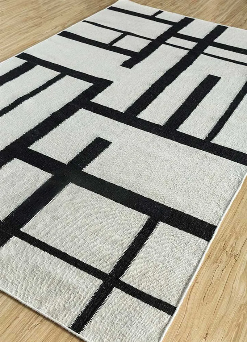 Wollteppich - 150 x 240 cm - schwarz-weiß