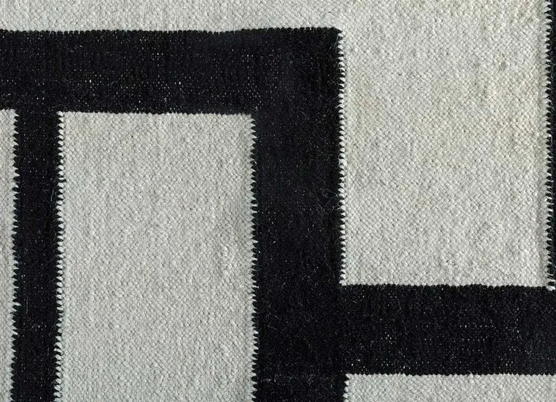 Wollteppich - 150 x 240 cm - schwarz-weiß
