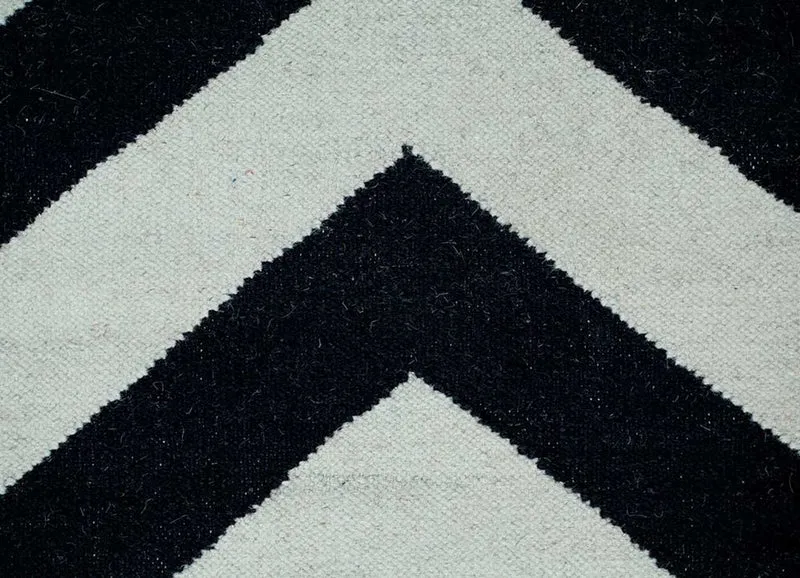 Wollteppich - 150 x 240 cm - schwarz-weiß