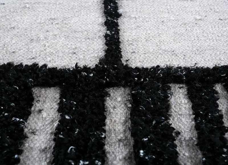 Wollteppich - 150 x 240 cm - schwarz-weiß