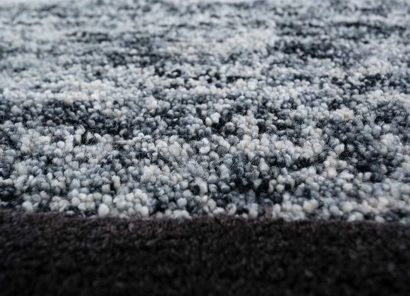 Wollteppich - 180 x 270 cm - schwarz-weiß