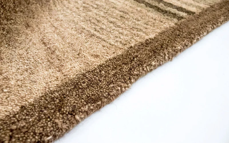 Wollteppich 139x196cm - beige