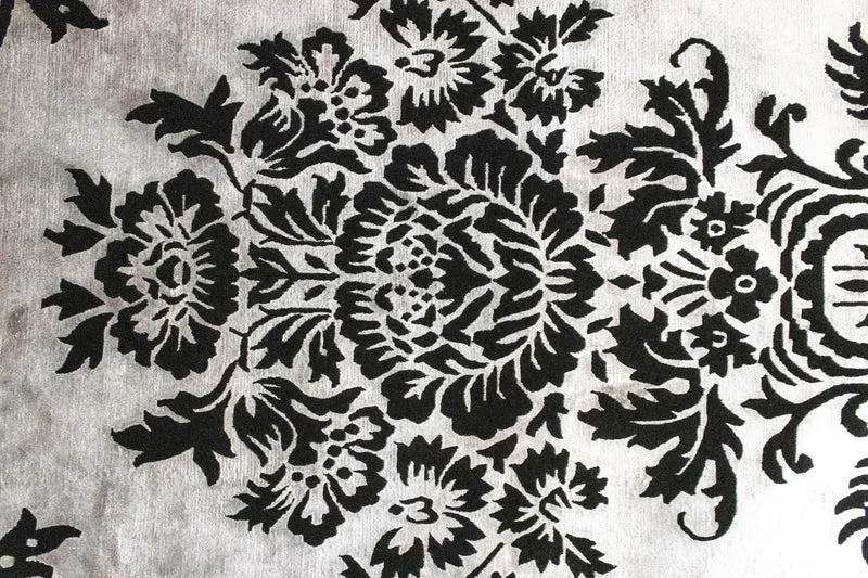 Designer Teppich 172 x 241 cm - schwarz