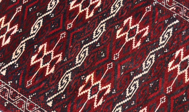 Afghan Teppich - Buchara 90 x 165 cm - dunkelrot