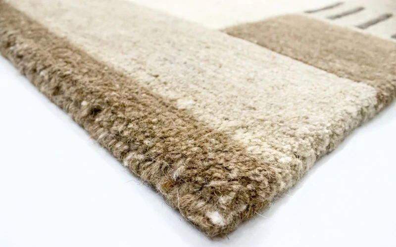 Nepal Teppich 122 x 174 cm - beige