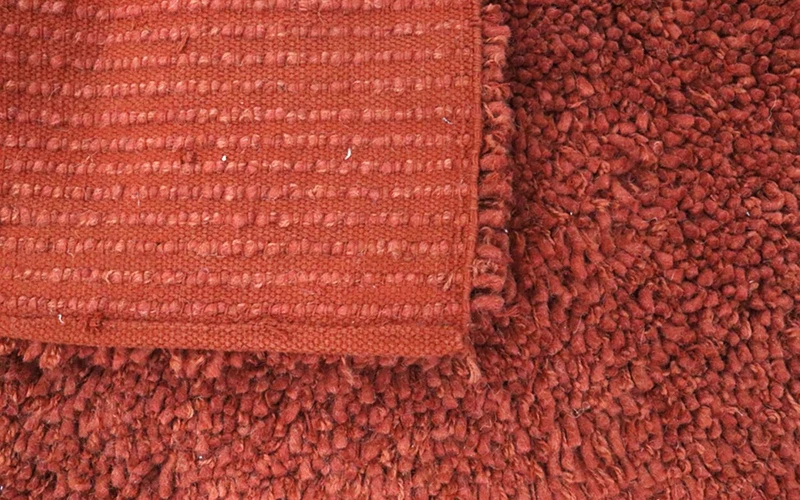 Hochflor Teppich 155 x 215 cm - rost