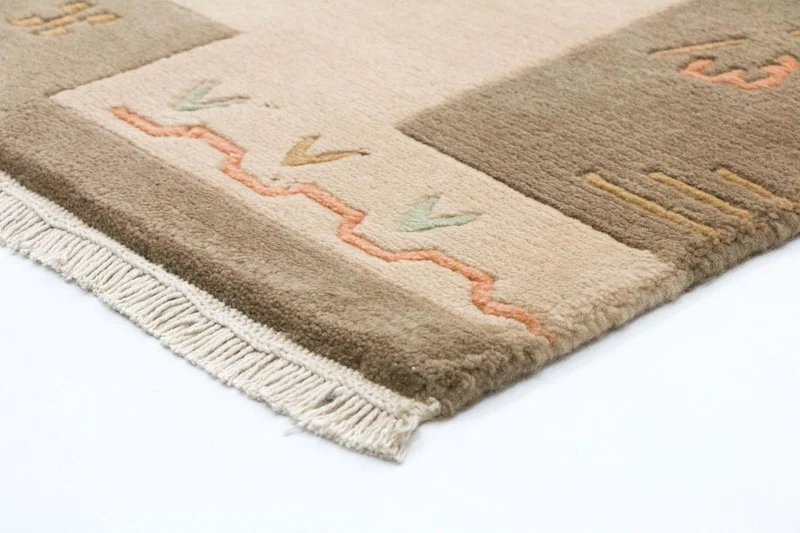 Nepal Teppich 124 x 182 cm - mehrfarbig