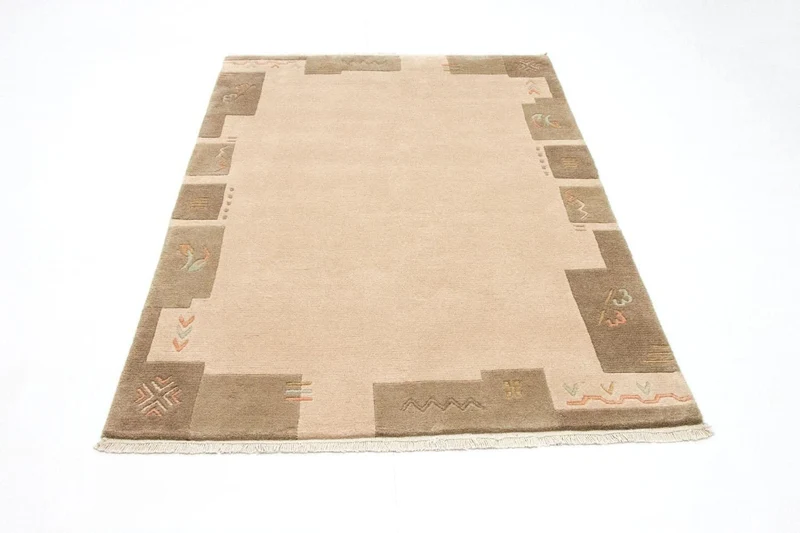 Nepal Teppich 124 x 182 cm - mehrfarbig