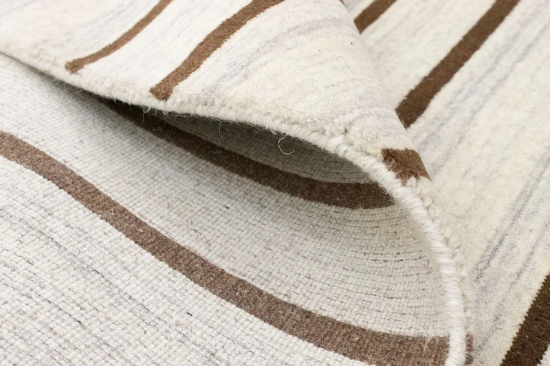 Wollteppich 121x178cm - beige
